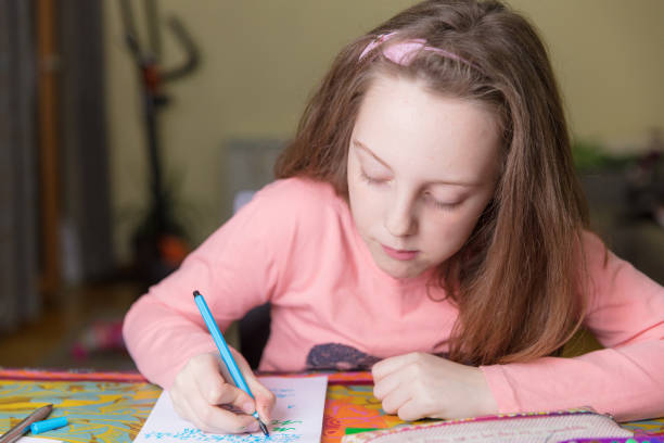 istock Little girl drawing 648539690