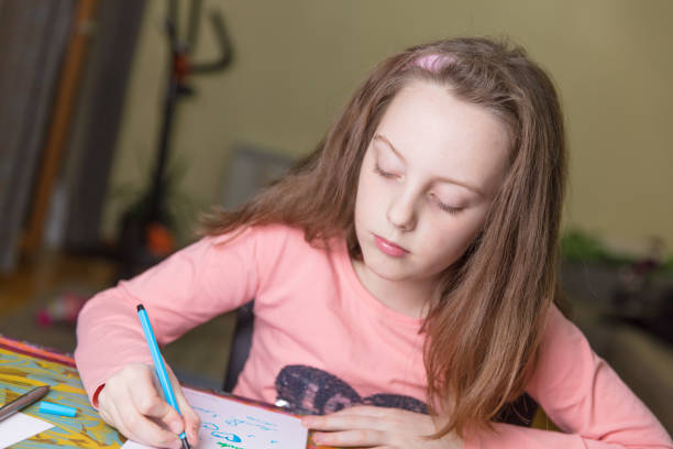 istock Little girl drawing 648539870