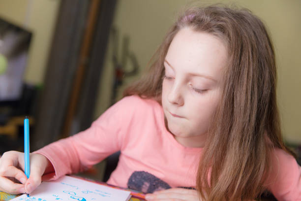istock Little girl drawing 648539964