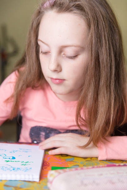istock Little girl drawing 648540124