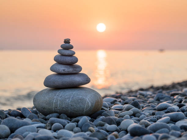 Pyramid of stones on sea coast