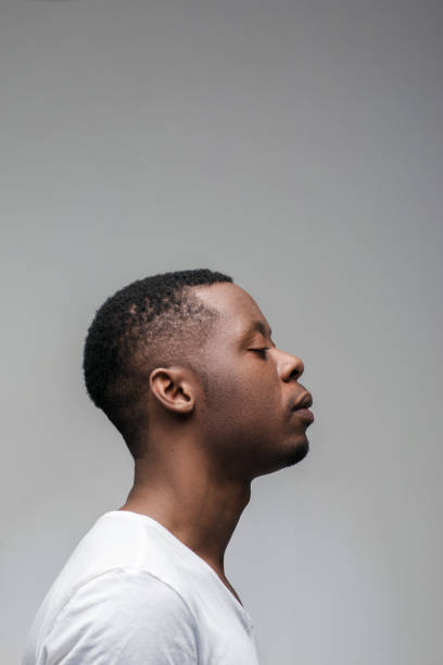 istock African man concentrated to get new ideas. Profile 648540292