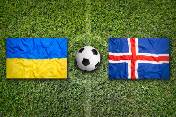 Ukraine vs. Iceland flags on soccer field