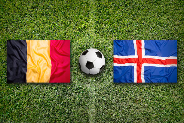 istock Belgium vs. Iceland flags on soccer field 648564876