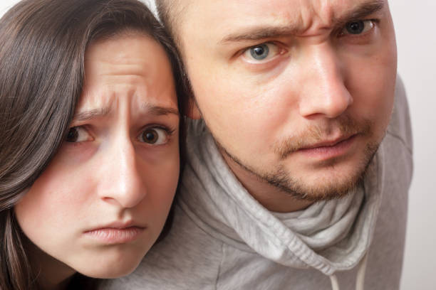 istock Caucasian man and woman look forward with anger 648568692