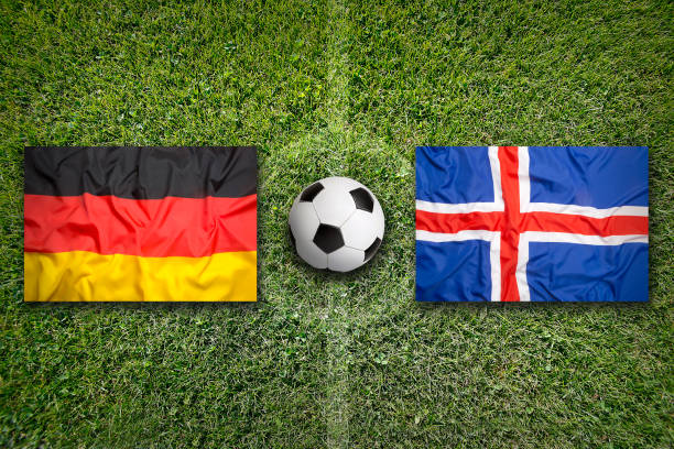 istock Germany vs. Iceland flags on soccer field 648572978