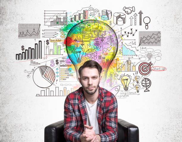 istock Man with bright business sketch 648572996