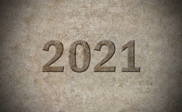 istock 2021 year sign carved out in stone 648576582