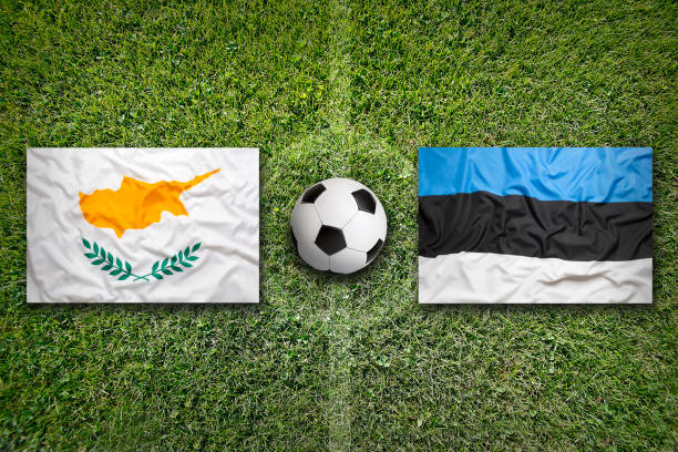 istock Cyprus vs. Estonia flags on soccer field 648579378