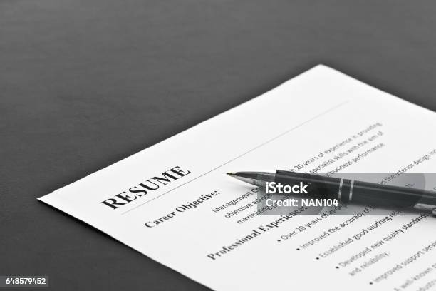 Resume On The Table Stock Photo - Download Image Now - Résumé, Writing - Activity, Job Interview