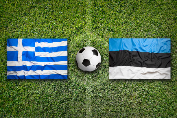istock Greece vs. Estonia flags on soccer field 648579542