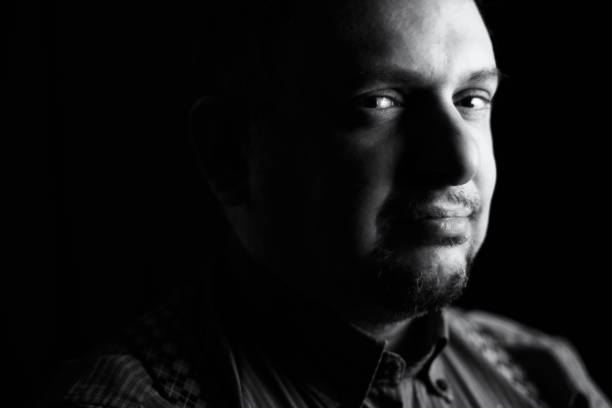 istock Senior man with a kind, good tempered look - chiaroscuro 648582752
