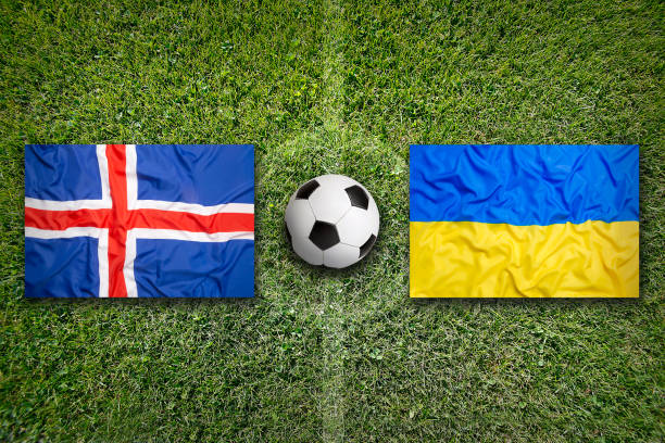 istock Iceland vs. Ukraine flags on soccer field 648585374