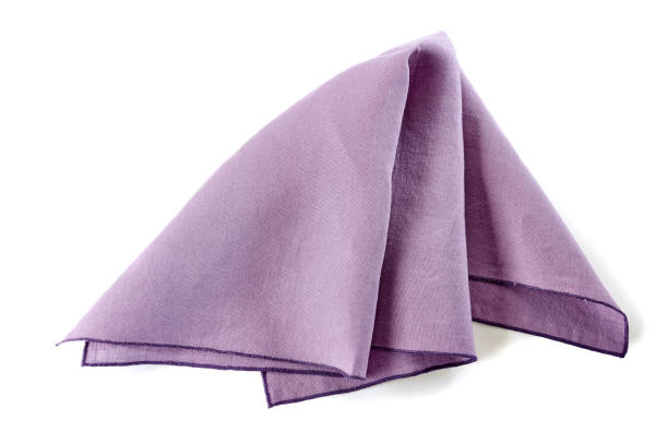 istock Crumpled violet textile napkin on white 648585460