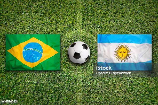 Banderas De Brasil Vs Argentina En El Campo De Fútbol Foto de stock y más  banco de imágenes de Argentina - iStock