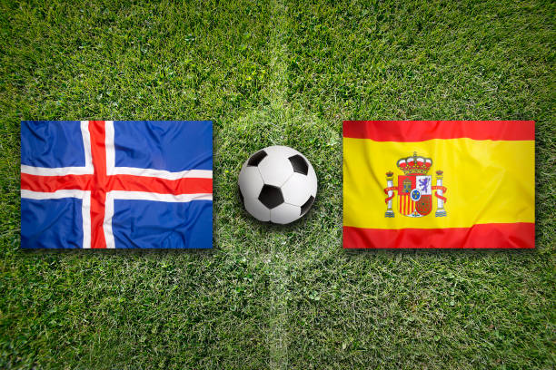 istock Iceland vs. Spain flags on soccer field 648599656