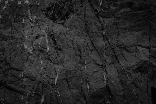 istock Black stone background grunge textured high quality closeup. May be used for design as background. Copy space 648618202