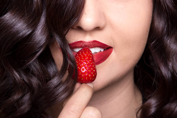istock skin lips hair closeup srawberry 648636954