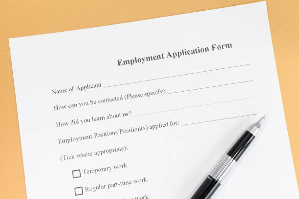 istock Close - up Blank employment application paper form 648640424