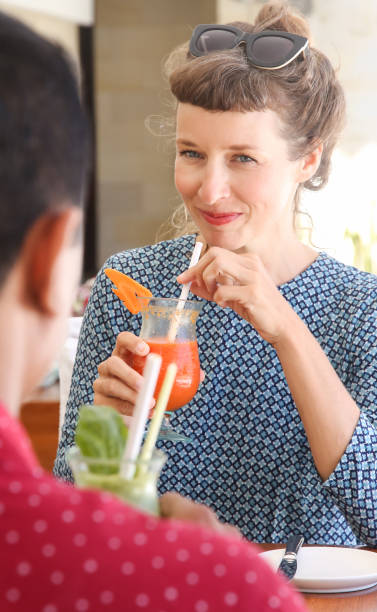 istock Casual woman in caffe with friend 648655548