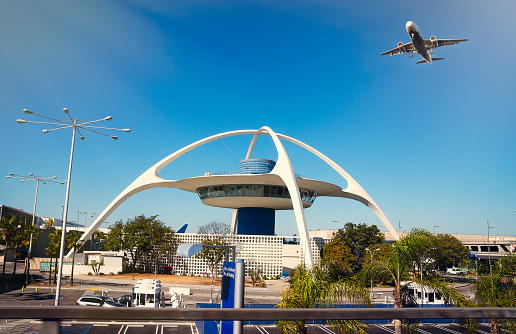 View of LAX airport with airplane taking off, Los Angeles, California
