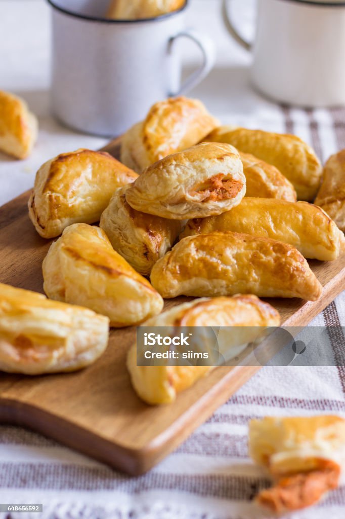 Tuna Empanadas Homemade puff pastry tuna empanadas are great party food. Meat Pie Stock Photo