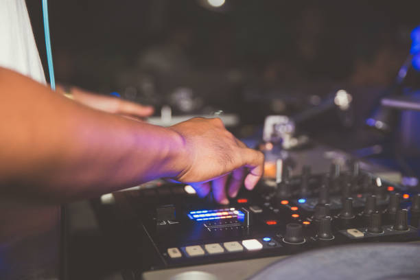 istock Male DJ mixing tunes 648659504