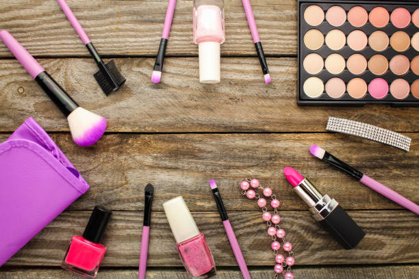 istock Women's accessories: cosmetic bag, makeup brushes, necklace, nail polish, lipstick 648672122
