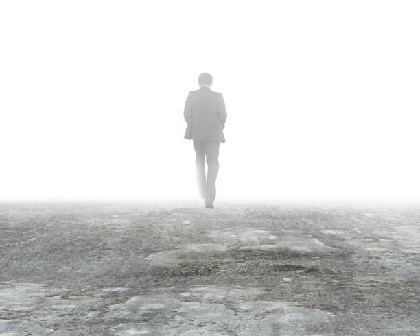 istock Man walking in mist on dirty concrete floor 648673924