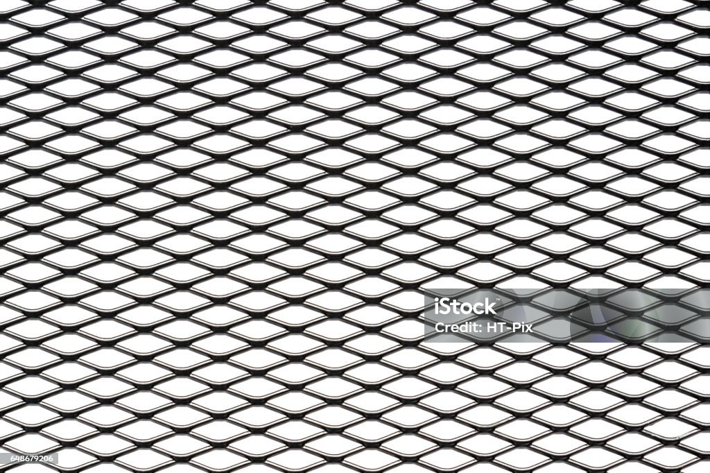 Metal mesh plating isolated against a white background Metal mesh plating isolated against a white background - Grid Wire Mesh Stock Photo