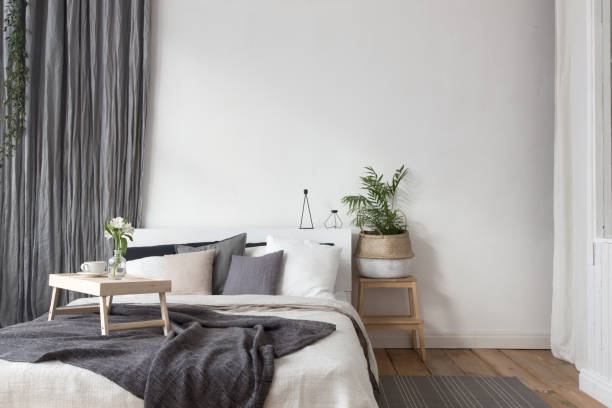 istock Interior of white and gray cozy bedroom 648679404