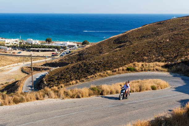 istock Couple on scooter in Mykonos 648679534