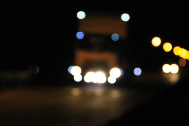 istock Bokeh blurred car lights at the night 648679558