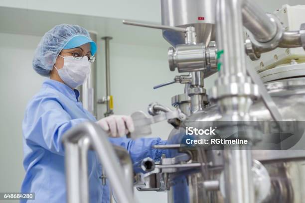 Portrait Of Pharmaceutical Worker Sterile Environment Stock Photo - Download Image Now