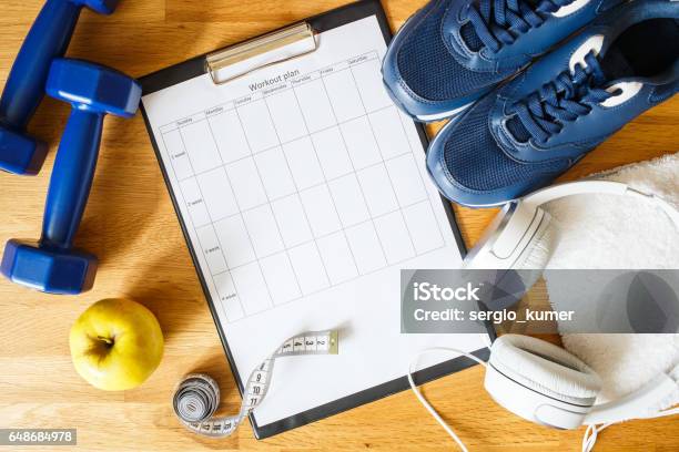 Personal Workout Plan With Sneakers And Dumbbells Stock Photo - Download Image Now - Exercising, Planning, Plan - Document