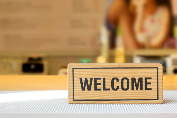 istock welcome sign on counter bar 648694428