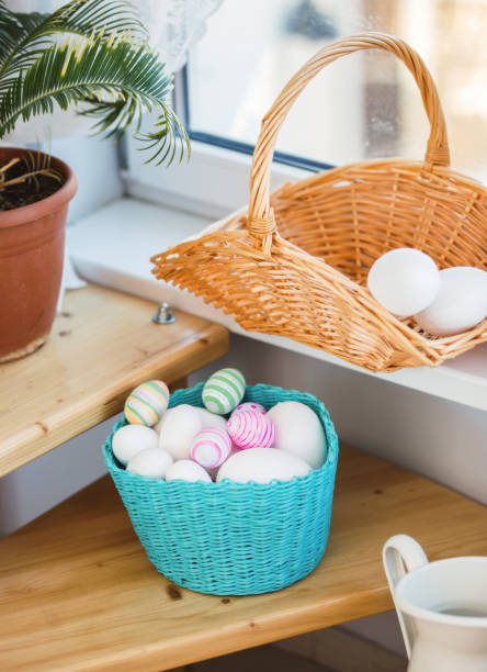 istock Easter basket with eggs on a wooden floor 648706442