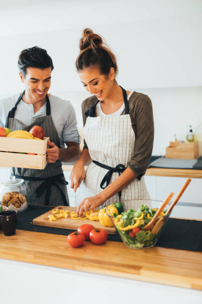 istock Young couple cooking in the kitchen 648717798