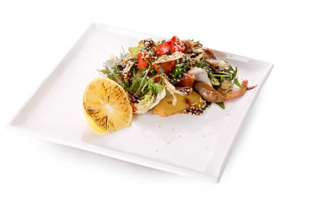istock salad with chicken and soy sauce and sesame seeds 648721416