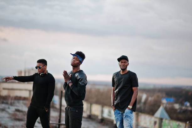 istock Three rap singers band on the roof 648721420