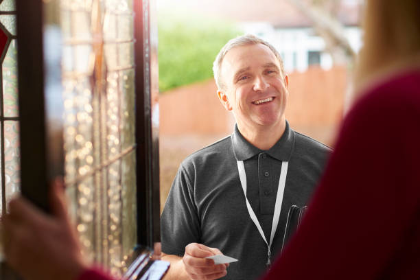 istock official man at the door 648733298