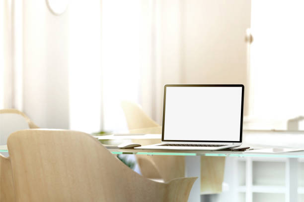 Blank laptop screen mockup in office, depth of field effect Blank laptop screen mockup in office, depth of field effect, 3d rendering. Modern portable computer display mock up, glass desk, wooden chairs. Coworking work room with empty pc monitor film screening stock pictures, royalty-free photos & images