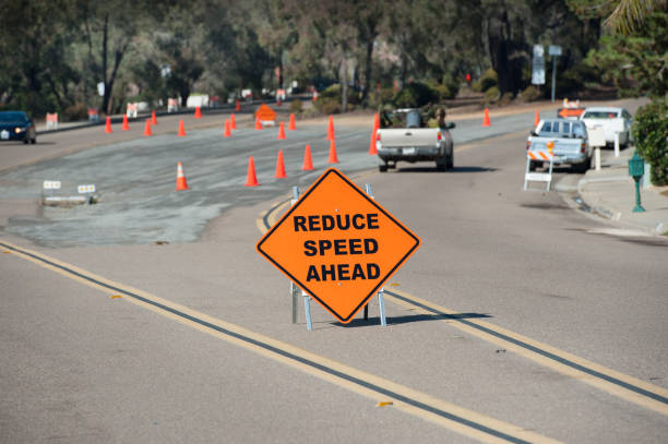 istock Reduce speed sign, california 648747762