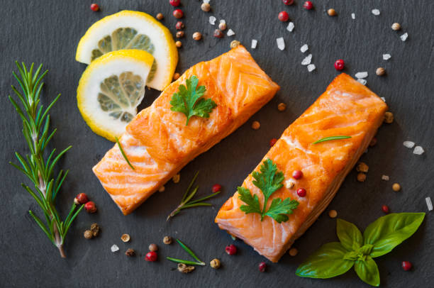 istock Salmon fish fillet with pepper and herbs 648747952