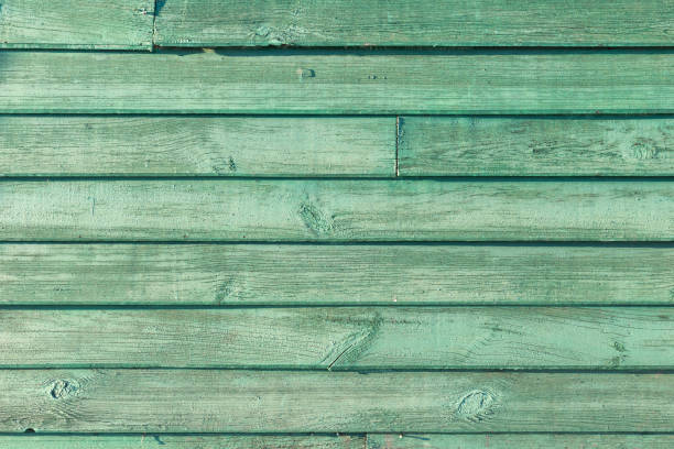 istock The old green wood texture with natural patterns 648752538