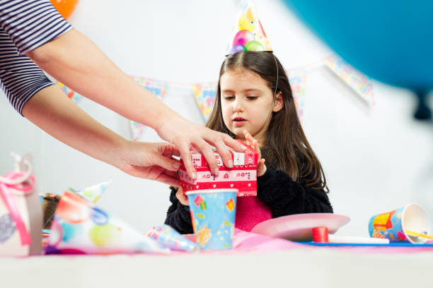 istock Little girl celebrates birthday 648752646