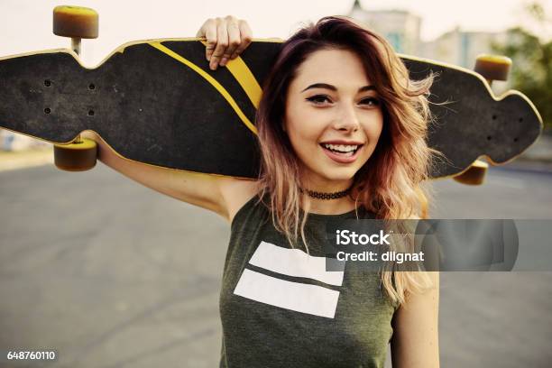 Beautiful Young Tattooed Girl With Longboard In Sunny Weather Stock Photo - Download Image Now