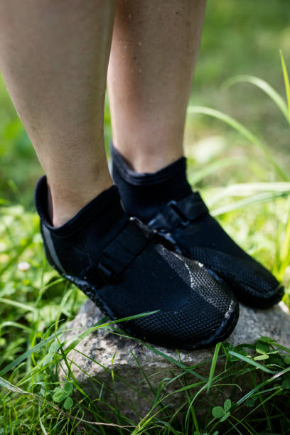 istock Close up of kayaking shoes 648760384