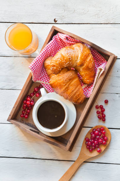 istock Breakfast with croissants and coffee 648761150