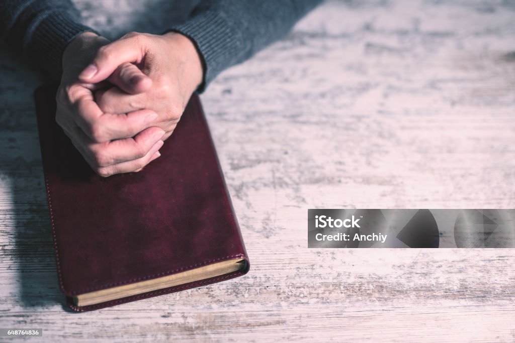 Woman worshiping god, close up Praying Stock Photo